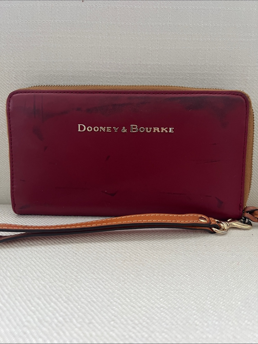 Dooney & Bourke Wine Red Leather Zip Wristlet with Tan Trim